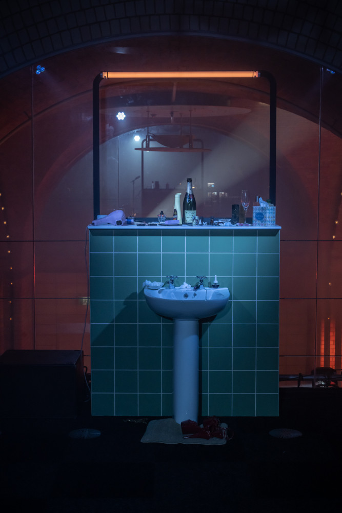 Two sinks facing one another off across the void